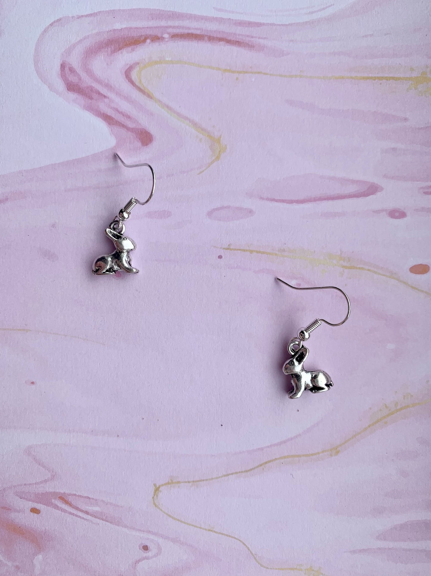 easter earrings. bunny earrings. Cute bunny alloy charm on silver plated hooks. dangle earrings. animal earrings.