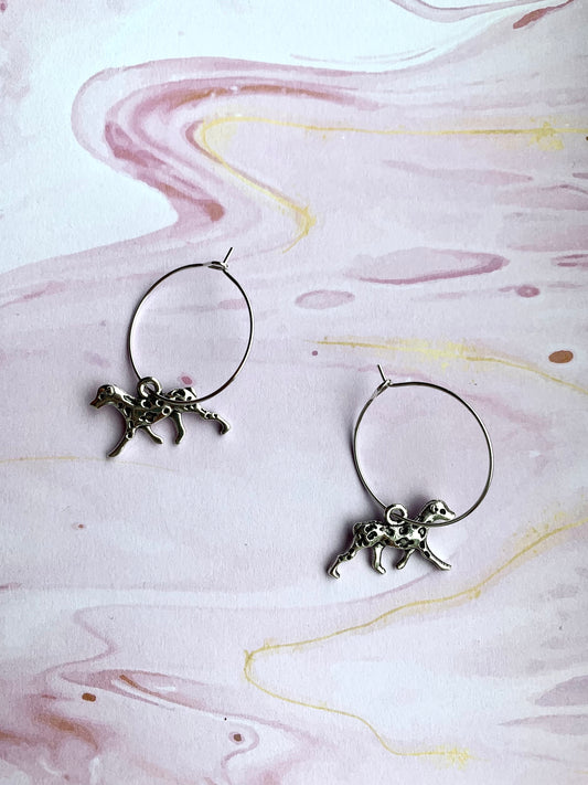 Super cute dog earrings. Silver coloured dalmatian charm on silver plated hoops. Perfect gift for dog lovers. Hoop earrings.