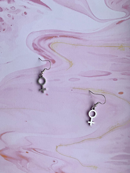 Silver coloured alloy female symbol charms on silver plated hooks. female earrings. feminist earrings. girl power. women power. 