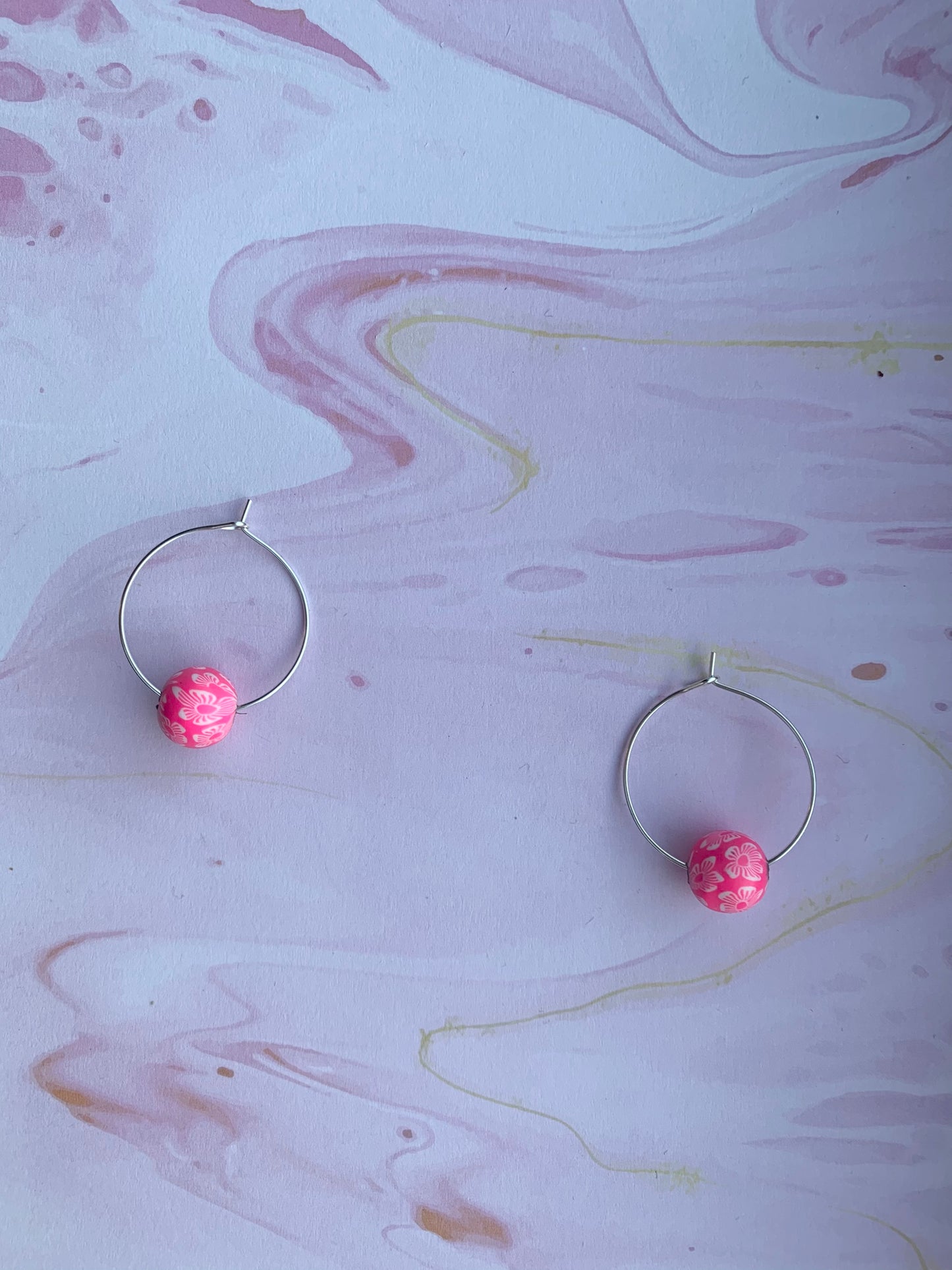Pink earrings. Polymer clay earrings. flower earrings. Polymer clay flower beads in a variety of colours on silver plated hoops. hoop earrings. 