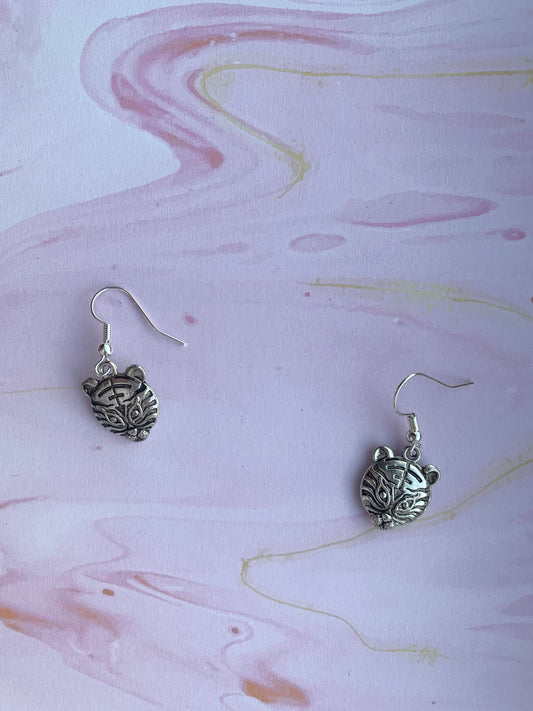 alloy silver coloured tiger face charms on silver plated hooks. animal earrings. carole baskin. tiger earrings. earring uk. 